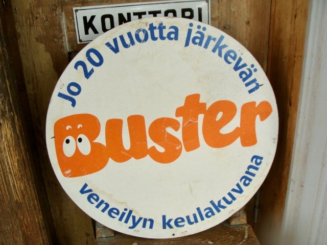 Buster- mainos, 2-puolinen